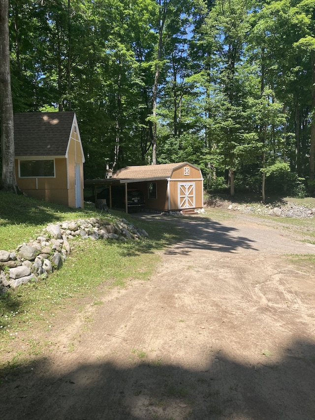 1548 Sunterra Trl, Boyne City, MI 49712 - view of yard with driveway
