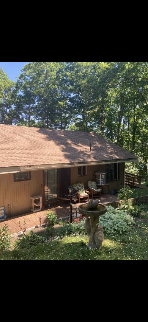 1548 Sunterra Trl, Boyne City, MI 49712 - back of house featuring a deck