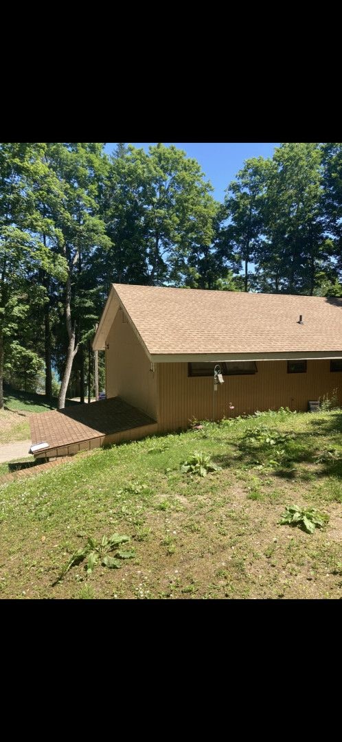 1548 Sunterra Trl, Boyne City, MI 49712 - view of side of home