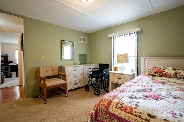 14424 Grenwich Ct, Shelby Twp, MI 48315 - bedroom with multiple windows, an office area, and light colored carpet
