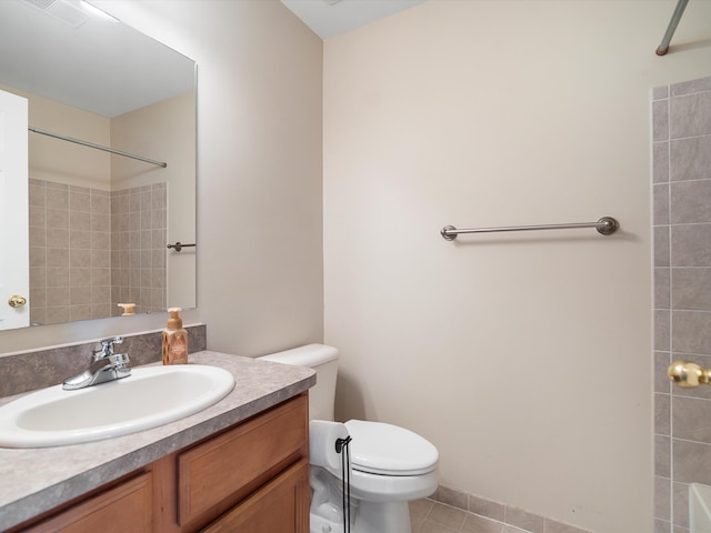 full bathroom featuring vanity, toilet, tile patterned floors, and a shower
