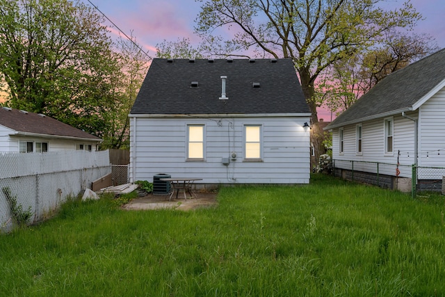 17041 Henry St, Melvindale, MI 48122 - rear view of house featuring cooling unit and roof with shingles