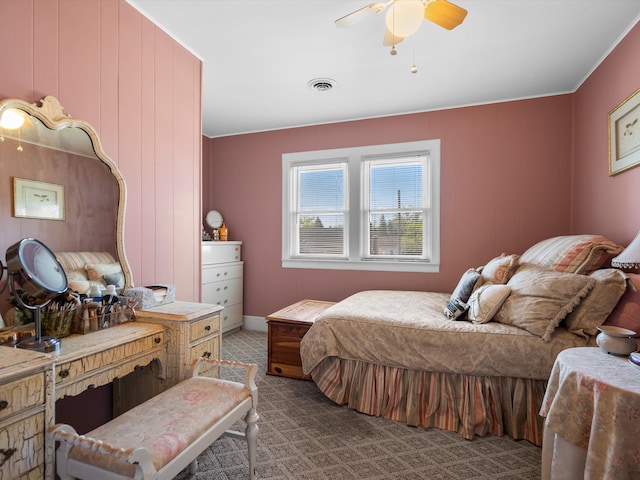 bedroom with carpet and a ceiling fan