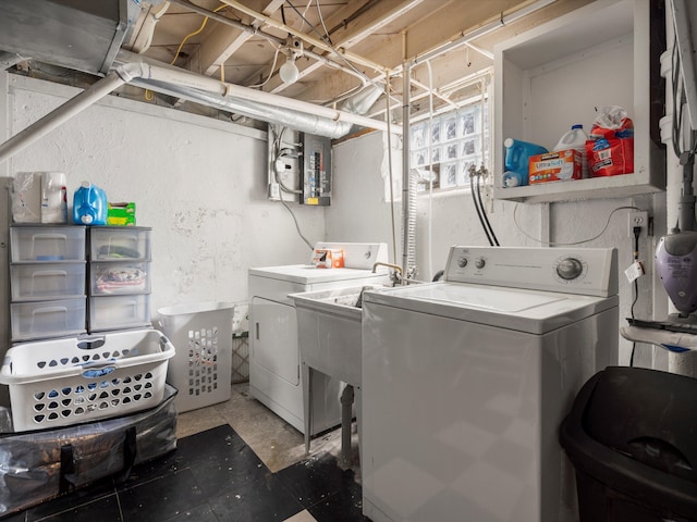 laundry area featuring washer and clothes dryer and electric panel