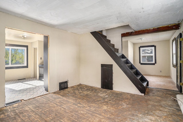 basement featuring stairs