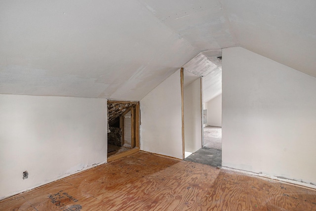 bonus room featuring lofted ceiling