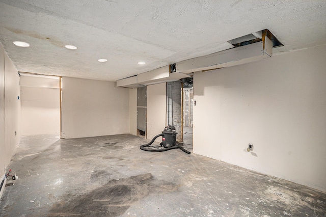 unfinished basement with recessed lighting