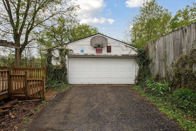 detached garage with fence