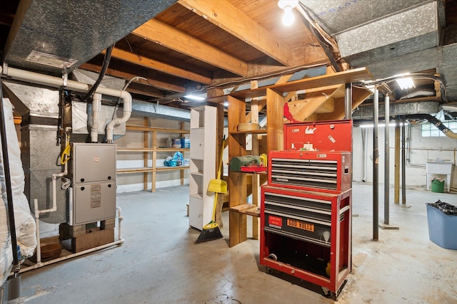 unfinished below grade area with a workshop area