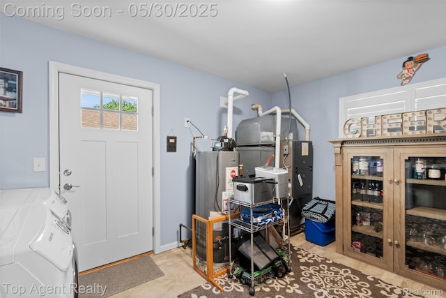 7910 Anchor Bay Dr, Clay, MI 48001 - foyer with independent washer and dryer and water heater