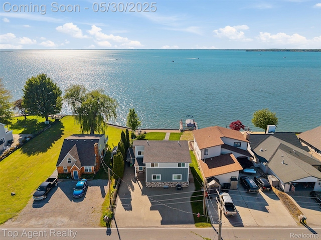 7910 Anchor Bay Dr, Clay, MI 48001 - aerial view of residential area with a large body of water