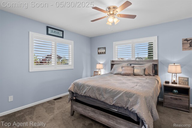 7910 Anchor Bay Dr, Clay, MI 48001 - carpeted bedroom featuring baseboards and ceiling fan