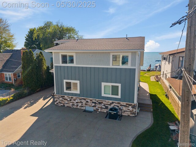 7910 Anchor Bay Dr, Clay, MI 48001 - view of outbuilding featuring a water view