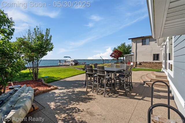 7910 Anchor Bay Dr, Clay, MI 48001 - view of patio featuring a water view and outdoor dining area
