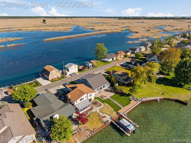 7910 Anchor Bay Dr, Clay, MI 48001 - aerial view of residential area featuring a nearby body of water