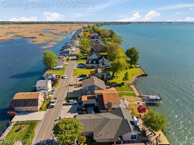 7910 Anchor Bay Dr, Clay, MI 48001 - aerial view of residential area featuring a nearby body of water