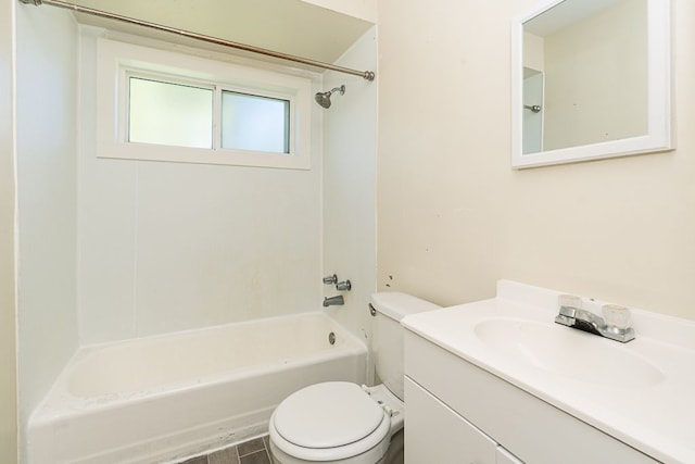 bathroom with toilet, shower / bathtub combination, and vanity