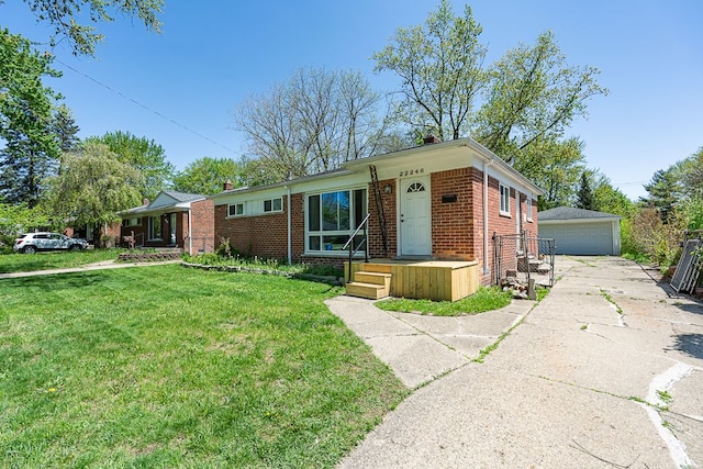 ranch-style house with a chimney, brick siding, an outbuilding, a front lawn, and a garage