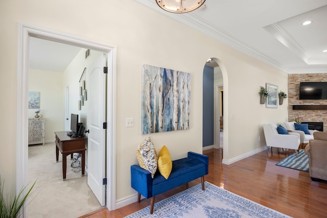 58651 Glacier Club Dr, Washington, MI 48094 - hall with arched walkways, wood finished floors, crown molding, baseboards, and recessed lighting