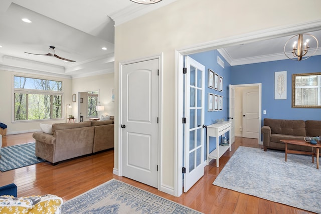 58651 Glacier Club Dr, Washington, MI 48094 - living room featuring crown molding, wood finished floors, a chandelier, a ceiling fan, and recessed lighting