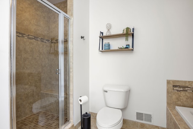 58651 Glacier Club Dr, Washington, MI 48094 - full bathroom with a shower stall, toilet, tiled bath, baseboards, and tile patterned floors