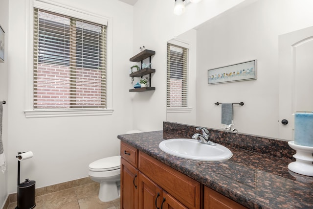 58651 Glacier Club Dr, Washington, MI 48094 - bathroom featuring toilet, vanity, tile patterned floors, and baseboards