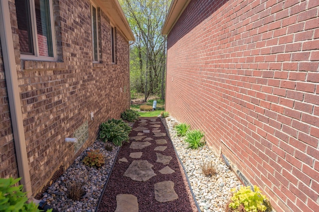 58651 Glacier Club Dr, Washington, MI 48094 - view of property exterior featuring brick siding