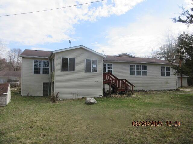 34637 76th St, Covert, MI 49043 - rear view of property featuring a lawn