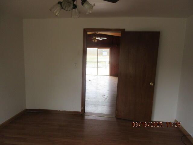 34637 76th St, Covert, MI 49043 - spare room with ceiling fan, wood finished floors, and baseboards