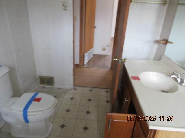 34637 76th St, Covert, MI 49043 - bathroom with vanity and toilet