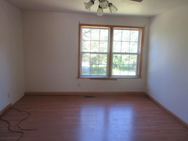 34637 76th St, Covert, MI 49043 - empty room with light wood-type flooring and a ceiling fan