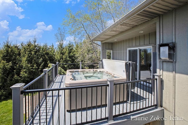 12250 Knoper Ct, Allendale, MI 49401 - wooden deck featuring a hot tub