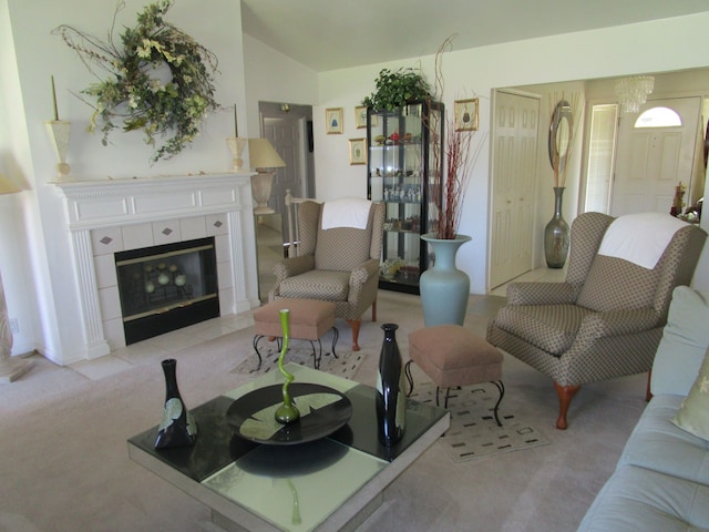 29100 Sunnydale St, Livonia, MI 48154 - carpeted living area featuring vaulted ceiling and a fireplace