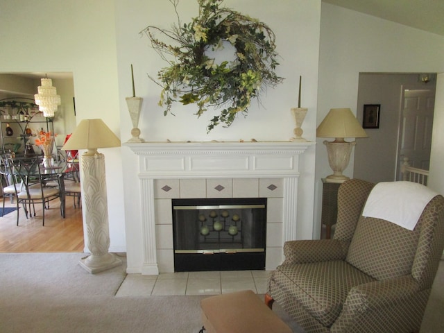29100 Sunnydale St, Livonia, MI 48154 - living area with a chandelier and a fireplace