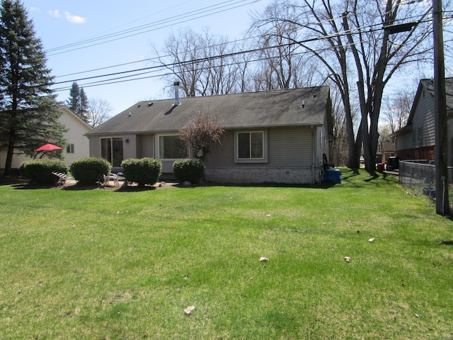 29100 Sunnydale St, Livonia, MI 48154 - rear view of property featuring brick siding and a shingled roof