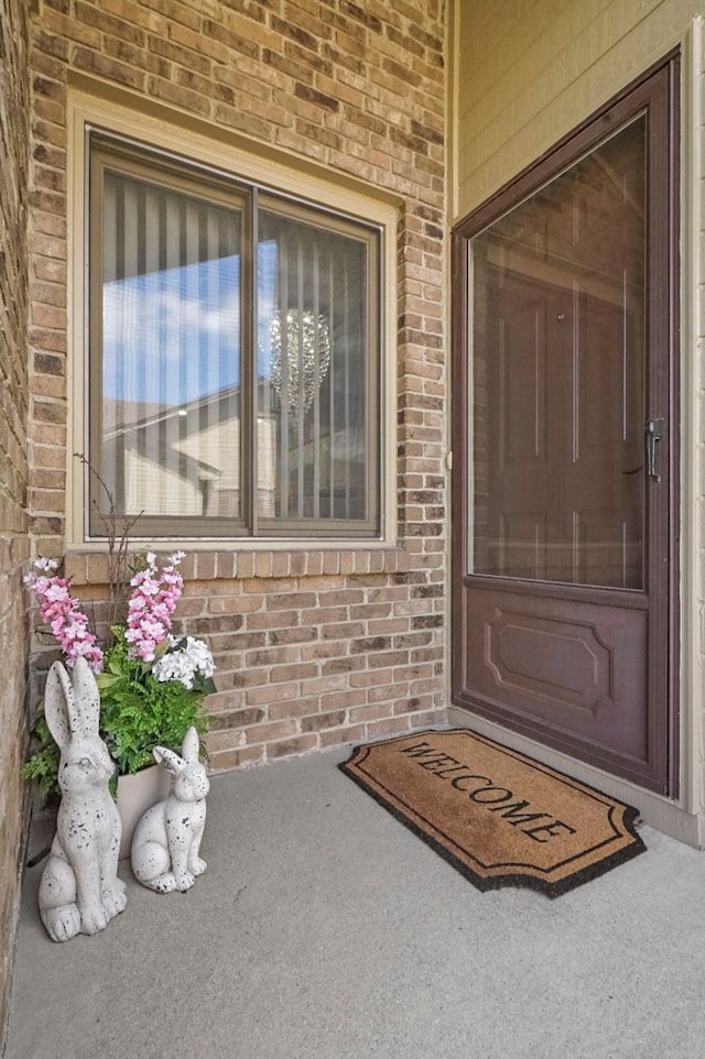 48775 Windmill Cir W, Macomb, MI 48044 - entrance to property with brick siding