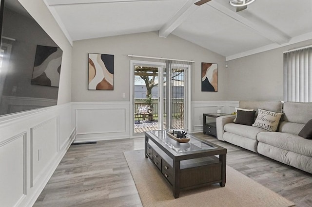 48775 Windmill Cir W, Macomb, MI 48044 - living room featuring wood finished floors, a wainscoted wall, a decorative wall, and ceiling fan