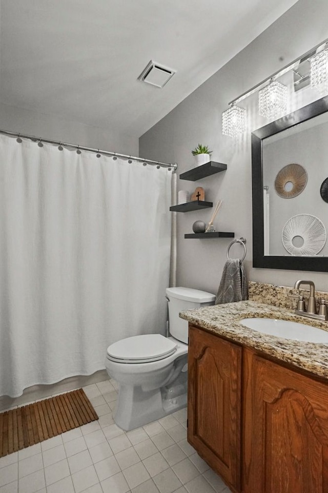 48775 Windmill Cir W, Macomb, MI 48044 - bathroom with toilet, vanity, tile patterned flooring, and curtained shower