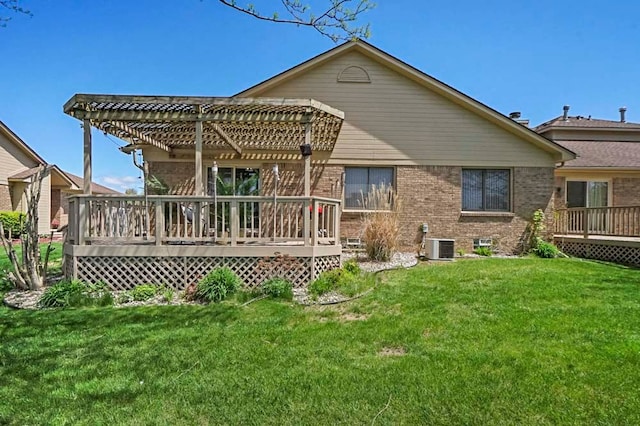 48775 Windmill Cir W, Macomb, MI 48044 - rear view of house with a pergola, a deck, and brick siding