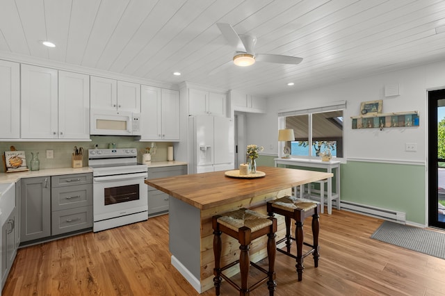 4150 Ridge Rd Unit 21, Stevensville, MI 49127 - kitchen featuring white appliances, gray cabinets, a baseboard heating unit, light wood finished floors, and recessed lighting