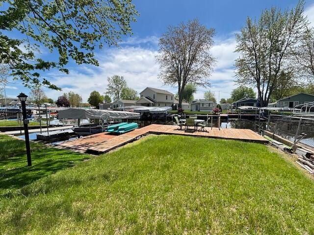 481 Maple Ln, Coldwater, MI 49036 - view of green lawn with a dock