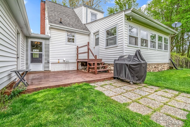 465 Ridge Rd, Quincy, MI 49082 - rear view of property featuring a deck, a lawn, and a shingled roof