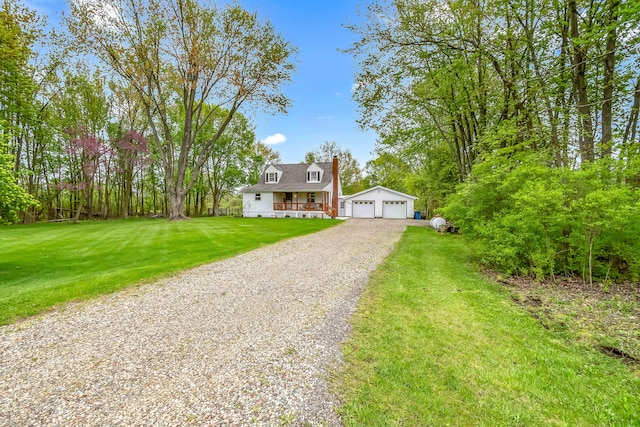 465 Ridge Rd, Quincy, MI 49082 - cape cod house with a front yard, a chimney, and a garage