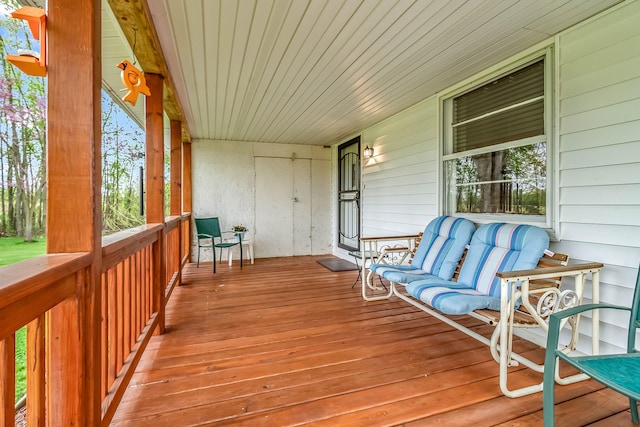 465 Ridge Rd, Quincy, MI 49082 - deck with covered porch
