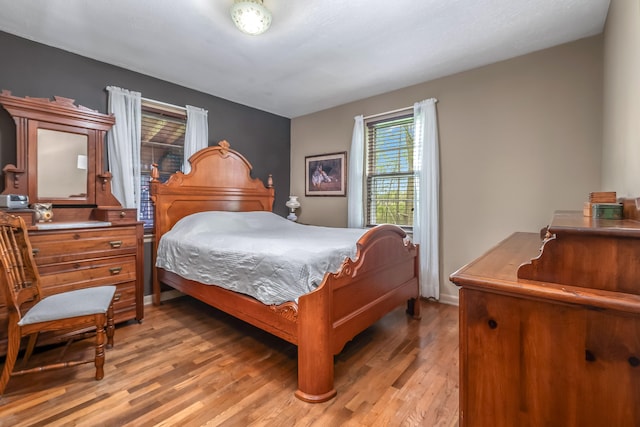 465 Ridge Rd, Quincy, MI 49082 - bedroom featuring light wood finished floors and baseboards
