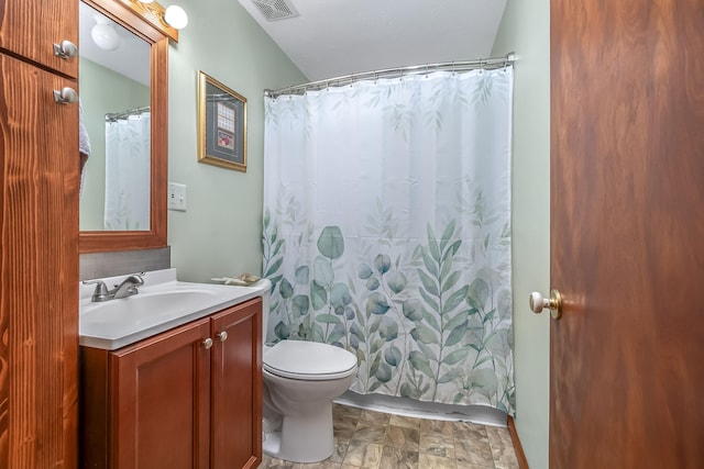 465 Ridge Rd, Quincy, MI 49082 - bathroom featuring vanity, toilet, and curtained shower