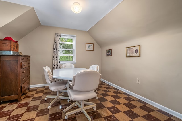 465 Ridge Rd, Quincy, MI 49082 - dining room with tile patterned floors, vaulted ceiling, and baseboards