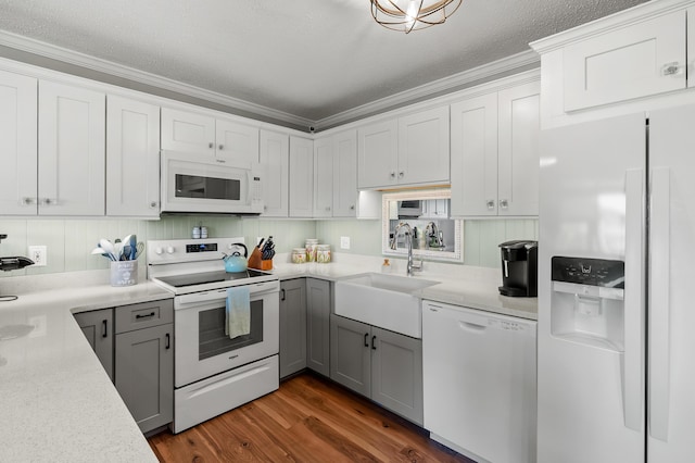 4150 Ridge Rd Unit 21And 22, Stevensville, MI 49127 - kitchen featuring white appliances, a sink, gray cabinetry, dark wood finished floors, and light countertops