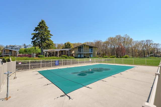 4150 Ridge Rd Unit 21And 22, Stevensville, MI 49127 - view of pool with fence and a patio