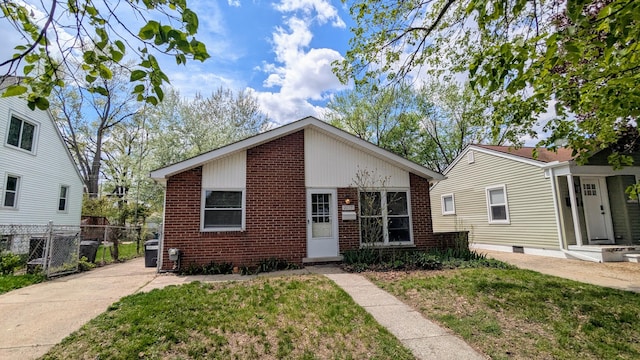 view of front of home featuring brick siding